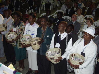 Ushers holding offering baskets