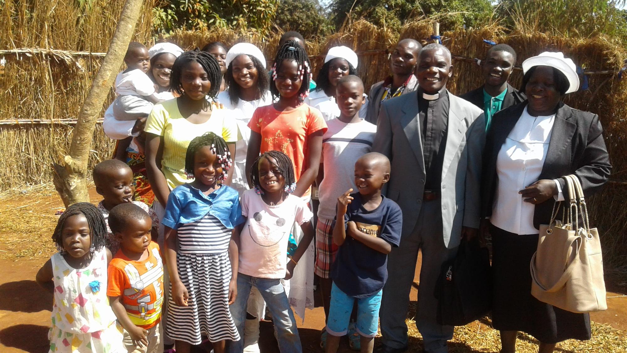 Laston Bissani, his wife Carlotta, and their family. Photos: courtesy of Laston Bissani.