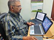 A man working at his laptop