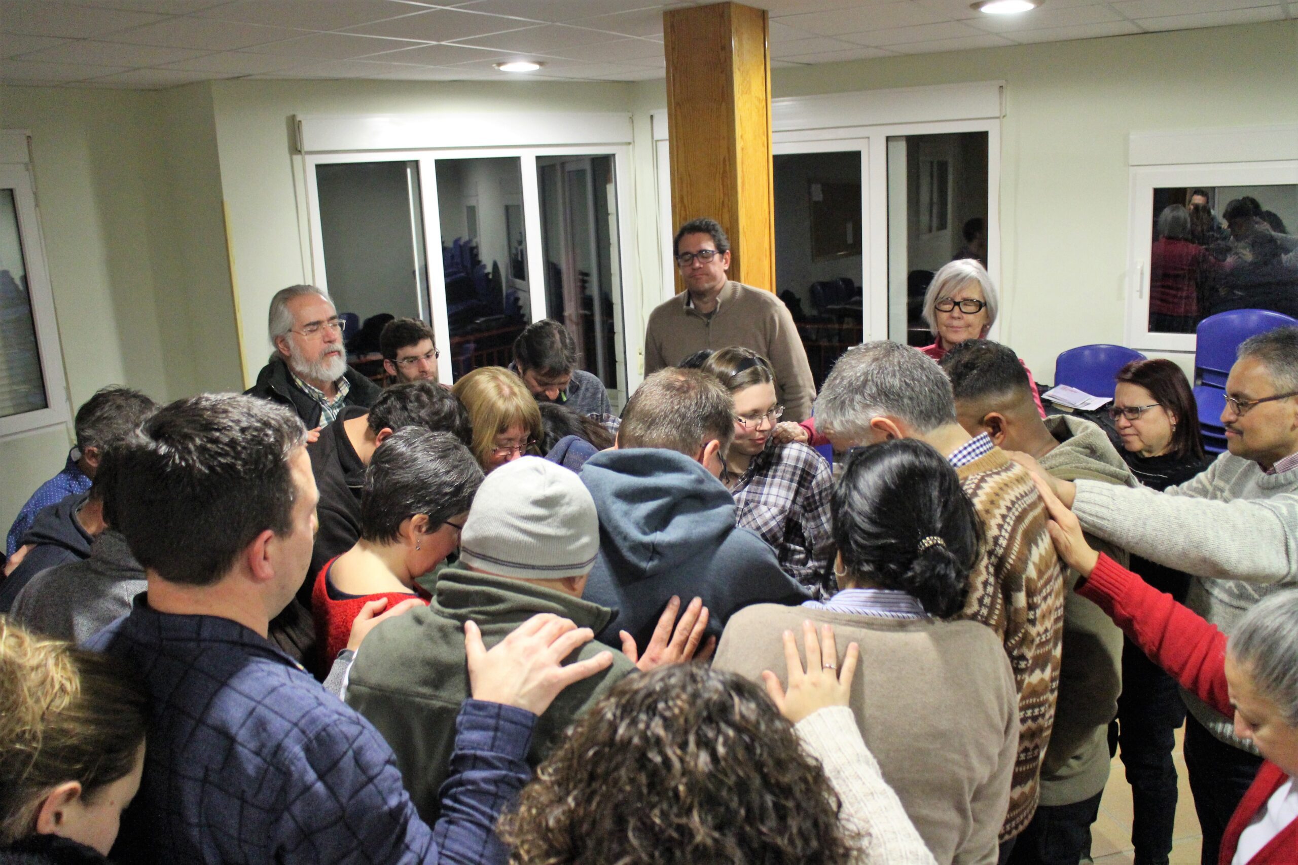 group praying in Spain