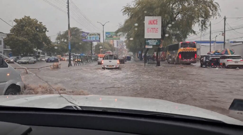Flooding in the streets of Piura, Peru, after a heavy rainfall. Climate change calls on us to love our neighbours.