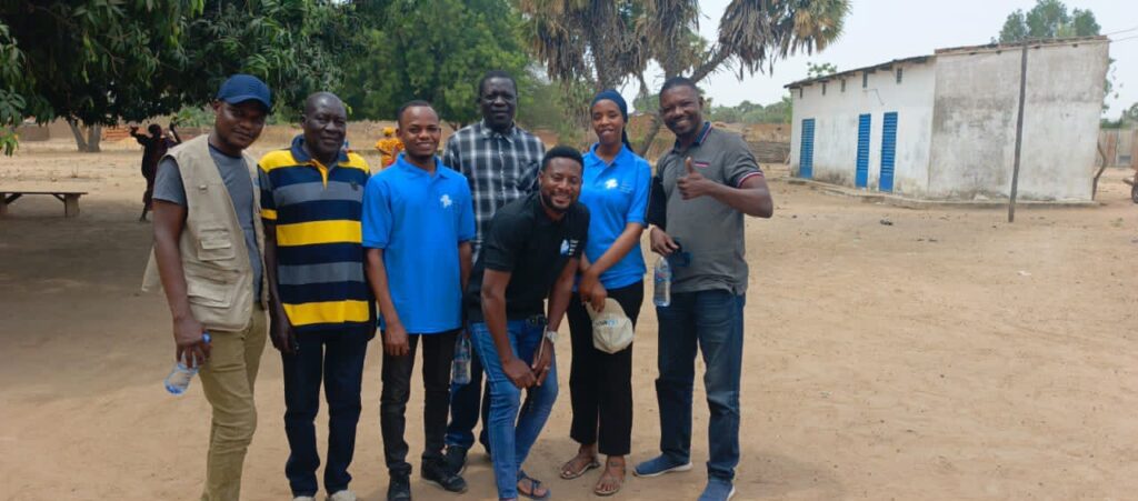 Moses Jumbo during a field visit, meeting with a partner organization of MCC Chad.