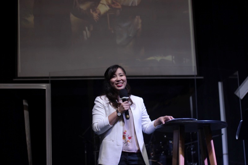 Asian woman preaching