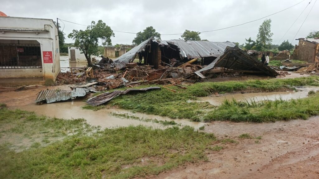 corrugated tin-roof mudbrick building collapsed