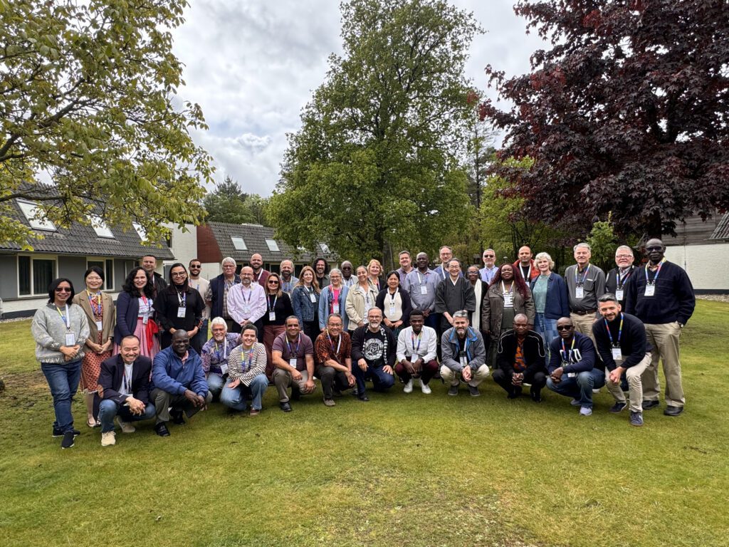 a group photo of MWC Commissions and staff