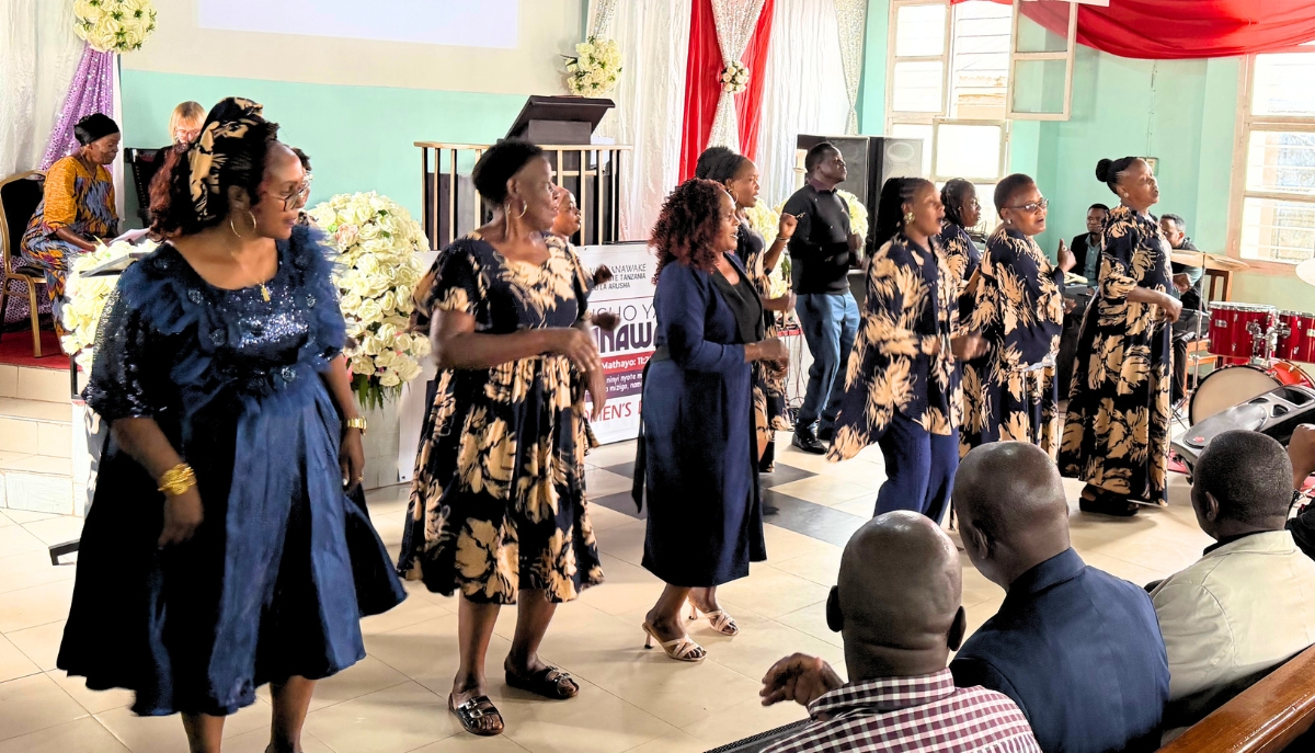 A group of African women singing at church